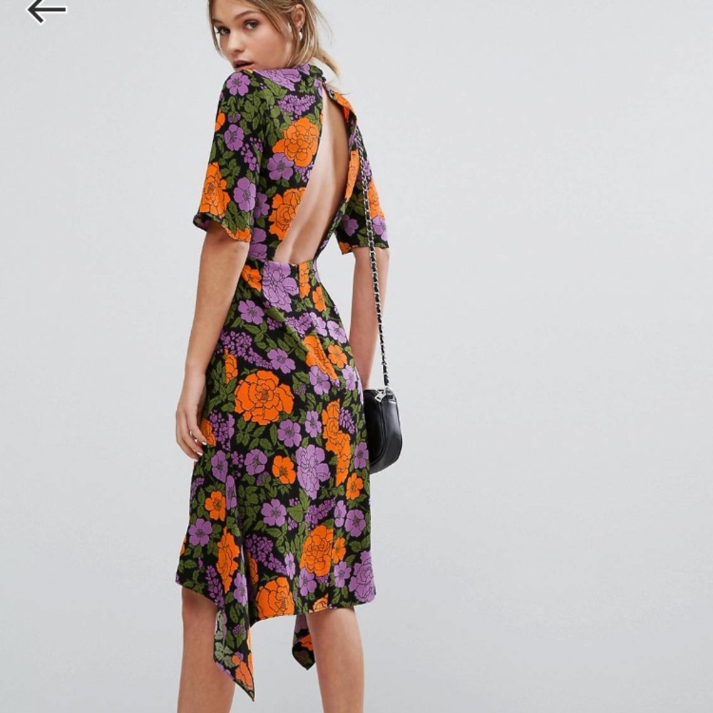 Super unique floral backless dress.